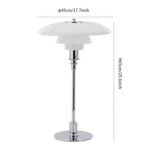 Danish metal table lamp in a disc shape