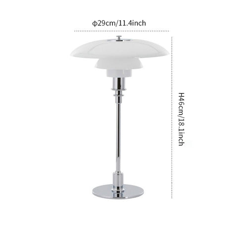 Danish metal table lamp in a disc shape