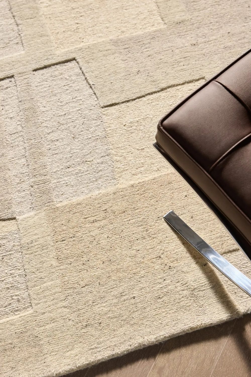 Beige hand-knotted wool rug