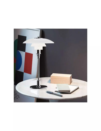 Danish metal table lamp in a disc shape