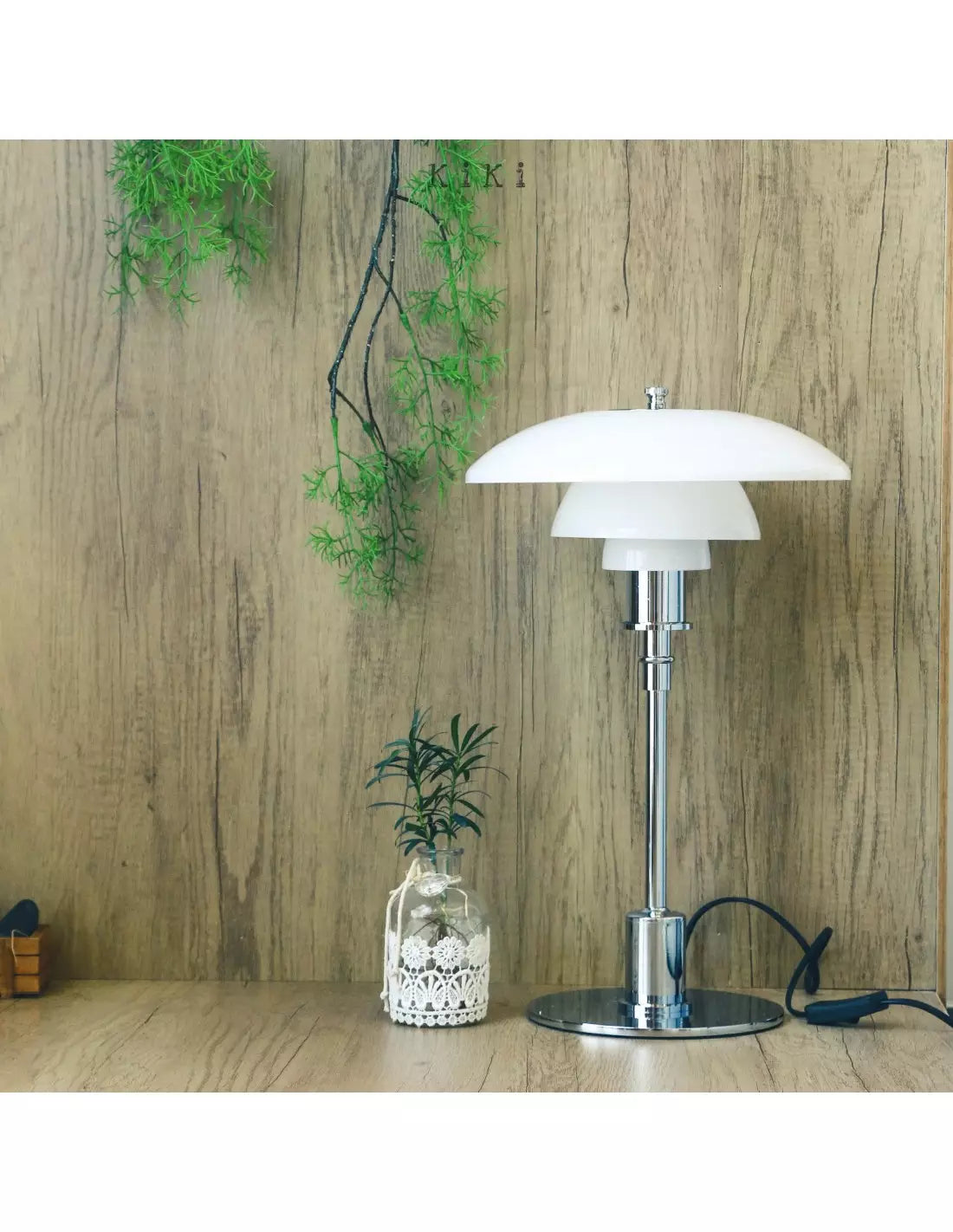 Danish metal table lamp in a disc shape