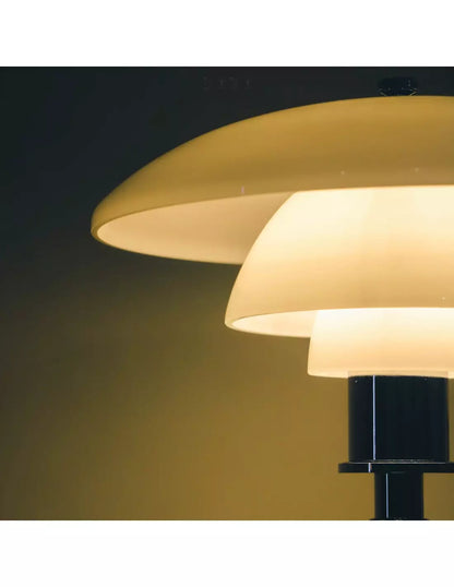 Danish metal table lamp in a disc shape