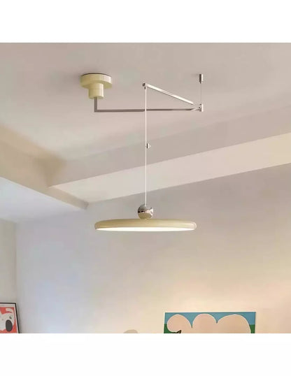 Modern pendant light with swiveling arm